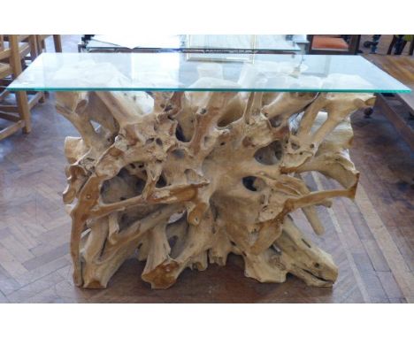 Teak root-wood console table with glass top, 120 x 85cm.