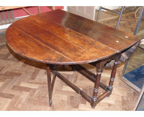 George III oak gate-leg table Condition reports cannot be done for our Interiors sales.