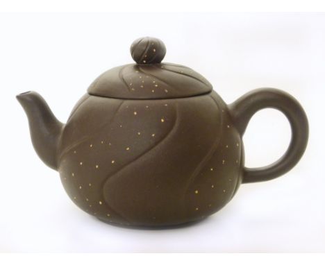 Chinese Yixing red stoneware teapot by "Fan", a factory craft artist. Condition reports cannot be done for our Interiors sale