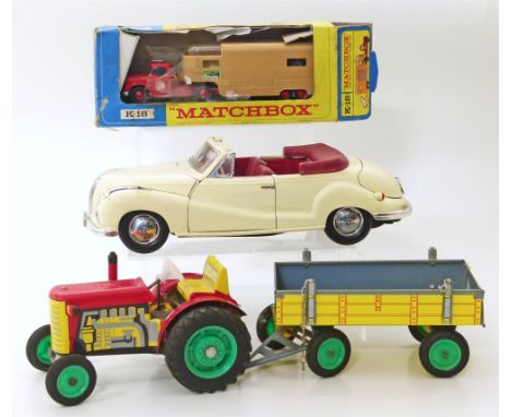 Tin plate Zetor tractor and trailer, Maisto BMW 5oz car and Matchbox king size articulated horse van (K-18). Condition report