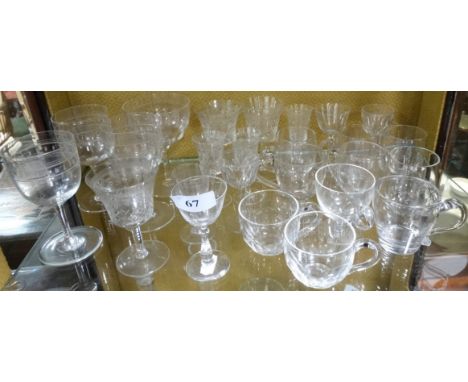 Top shelf of stemmed Edwardian glasses & various custard cups 