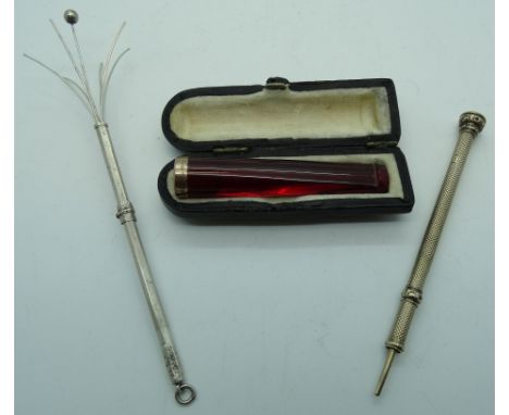 Amber & gold cased Cheroot holder, white metal swizzle stick + gold colour propelling pencil 