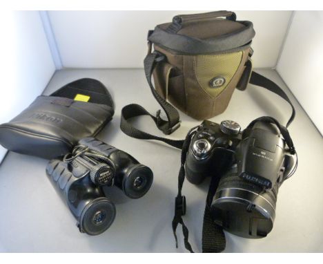 A Fuji Finepix digital camera and a pair of binoculars