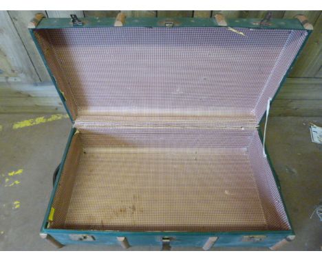 A Large wooden bound steamer trunk