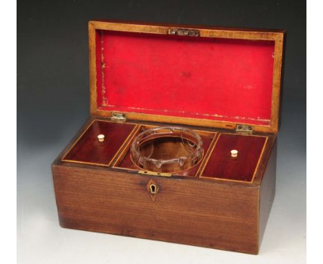 A GEORGE III MAHOGANY TEA CADDY with ring handle, twin compartments and mixing bowl, 30cm wide