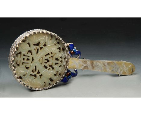 A CHINESE WHITE JADE AND SILVER MOUNTED MIRROR with blue enamel bat ornament and tapering handle, 14.5cm long