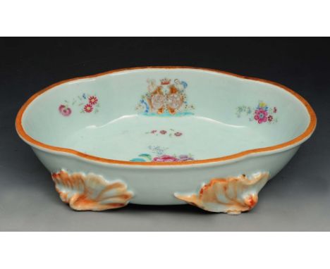 A CHINESE QIANLONG FAMILLE ROSE ENAMEL SHAPED OVAL BOWL, with armorial and summer flower decoration on shell feet 32.5cm