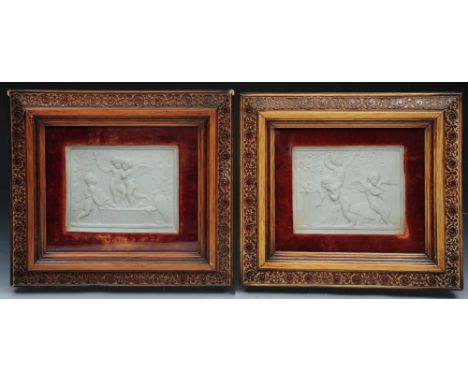A PAIR OF COPENHAGEN RECTANGULAR WHITE CERAMIC PLAQUES each depicting classical figure scenes with putto and swan, 12.5cm in 