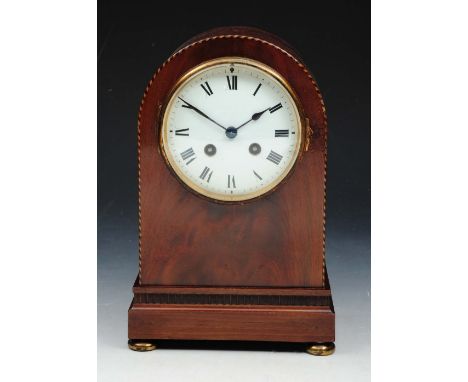 A MAHOGANY MANTEL CLOCK, with inlaid decoration, white enamel dial, Roman numerals and striking French mechanism, stamped G.B