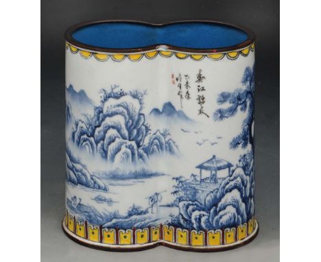 A CHINESE CANTON ENAMEL DOUBLE BRUSH POT, painted in blue with a continuous landscape, within yellow borders, 10.5cm high