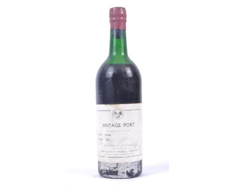 A bottle of Dow 1963 Vintage Port Army &amp; Navy Stores Ltd. Some wear to seal &amp; label.