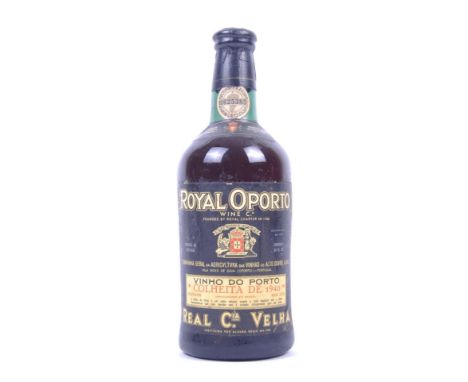 Vintage bottle of Royal Oporto 1973 Wine Port. 26 Fl Oz. Good condition with good label and seal.