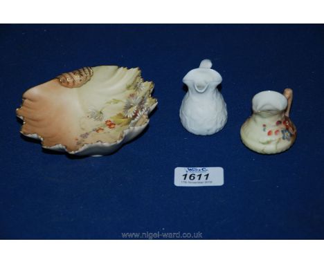 A Royal Worcester blush shell shaped pin dish and a miniature jug, also a small Victorian Parian jug.