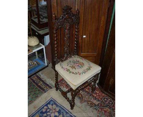 A pretty Walnut framed Hall Chair of small proportions having mirrored twist legs and backrest supports and "H" stretcher, th