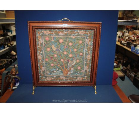 A Firescreen with a fabric panel in 'Tree of Life' style.