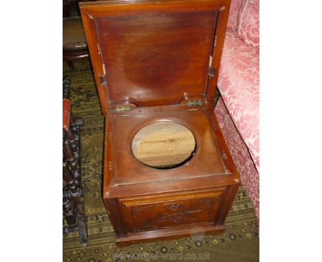An Edwardian Mahogany box Commode having raised and fielded front panel with stylised flowering twig depicted (unfurnished), 
