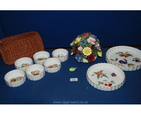 Two Royal Worcester 'Evesham' flan dishes and six matching ramekins and a china floral display