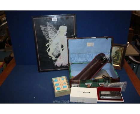 A plaid covered vanity case and contents to include recorder, Casio computer quartz, a needlepoint of a fairy (framed), etc.