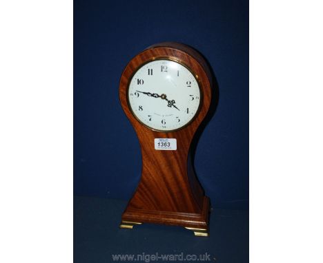 A Comitti of London battery mantle clock of balloon form.