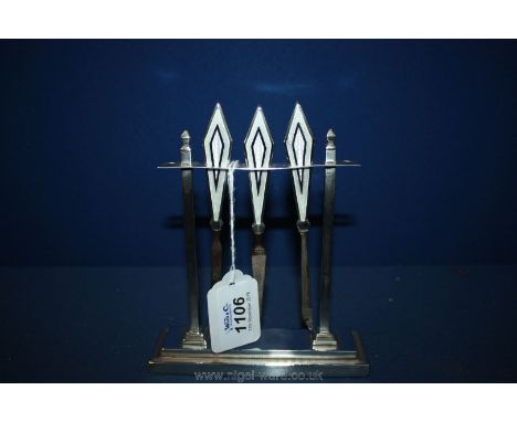 A stunning Art Deco silver and enamelled Manicure set with silver architectural rectangular stand, 5" long. The three nail to