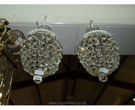 A pair of matching vintage glass pendant Light shades.