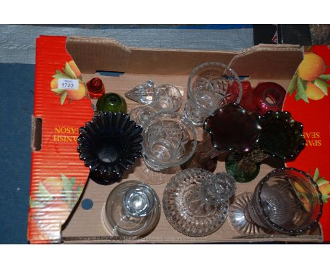 A quantity of glass including two decanters with stoppers, a pair of footed vases, paperweights, cranberry glass light shade,