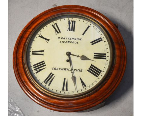 A 19th century station type thirty hour wall clock the dial set with Roman numerals and marked 'R. Patterson, Liverpool Green
