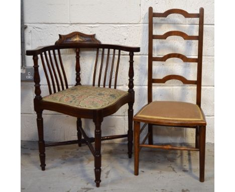 An Edwardian inlaid corner chair on turned legs and stretchers, upholstered in pale green and pink tapestry style fabric, and