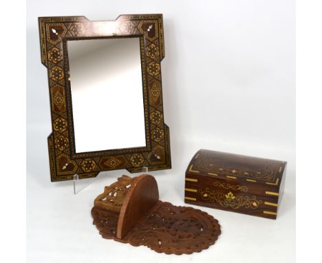 A small carved fretwork wall shelf, an inlaid jewellery box and a small rectangular mirror with marquetry work border (3).