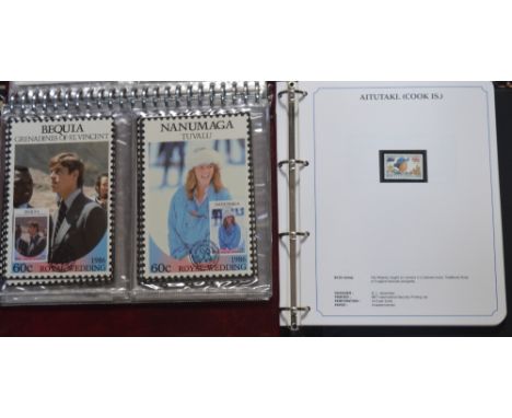 An album of forty first day covers and cards commemorating royal events and a collection of stamps to a blue album commemorat