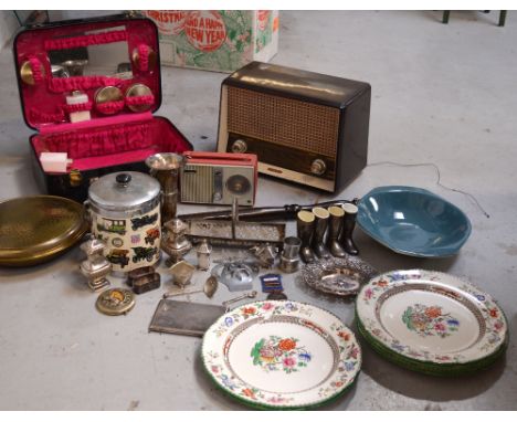 A quantity of silver plated items to include a cruet set, a trumpet vase, a copper warming pan, a cased vanity set, a vintage