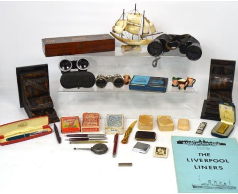 A collectors lot comprising boxed gold plated Dunhill lighter, a cased pair of Colmont Setix 7 x 50 binoculars and further bi