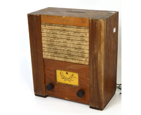 A vintage wooden cased AC model war time civilian receiver.