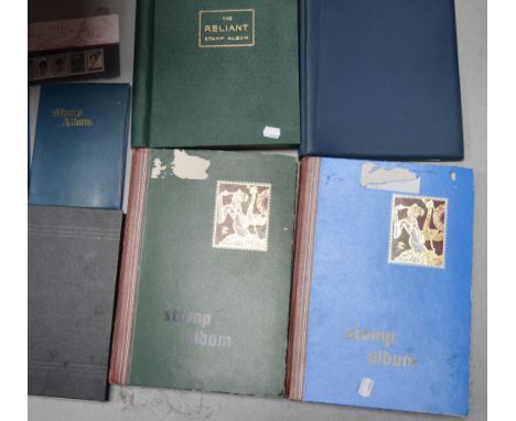 Seven stamp albums, each containing a large quantity of stamps to include first day covers, and stamps from countries to incl