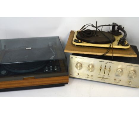 A Garrard 86SBMK11 turntable and a Garrard R.C. 121H turntable and a Murantz model 190 amplifier (3).