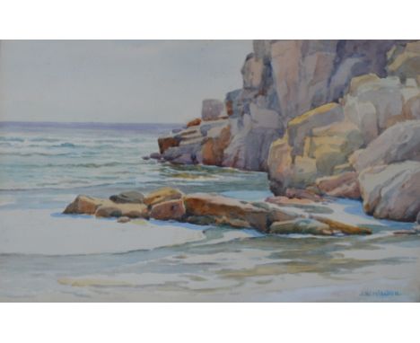 J. W. MILLIKEN (1887-1930); a watercolour depicting rocks and seascape, signed lower right, 24 x 35cm, framed and glazed.
