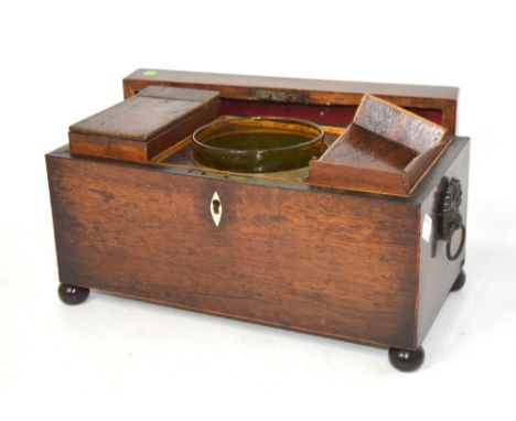 A 19th century rosewood two division tea caddy with interior mixing bowl and twin loop handles on bun feet, width 30cm (af).