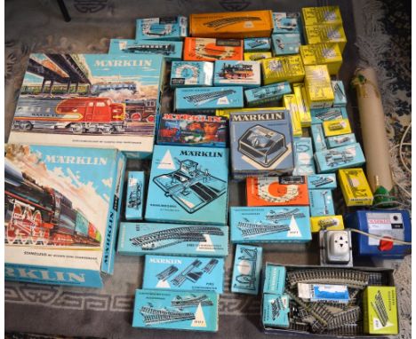 A good and extensive collection of Marklin trains and accessories to include two boxed sets; 3134 and 3148, various transform