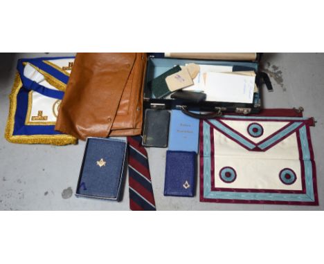 A leather case containing a quantity of Masonic memorabilia relating to Gayton Lodge to include various Masonic books, tie, s