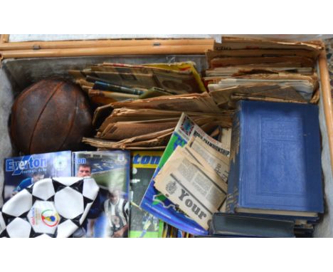 A quantity of late 20th century Everton FC programmes and publications and three vintage footballs, mid 20th century newspape