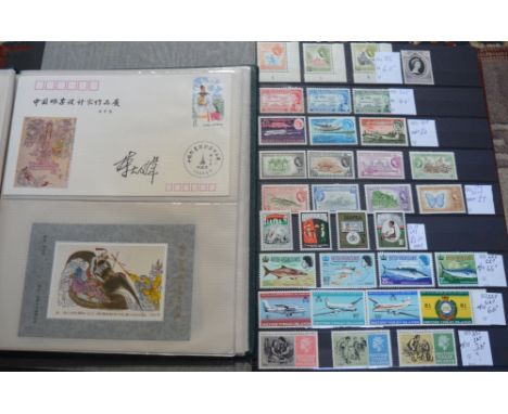 A stock book containing largely mint/used Commonwealth stamps and an album of Chinese first day covers and miniature sheets (