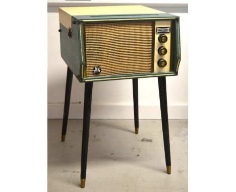 A 1960s freestanding Dansette record player, model no. 209, twin tone emerald green and cream cabinet complete with illuminat