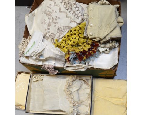 A quantity of linen lace and embroidery to include two Edwardian children's christening gowns, a small woollen cape and a vin