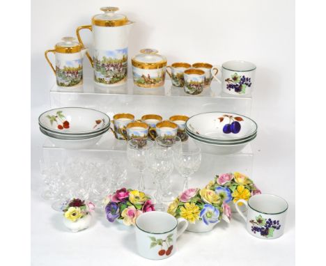 A quantity of Royal Worcester 'Evesham Vale' pattern dinnerware and teaware, comprising dinner plates, bowls, cups and saucer