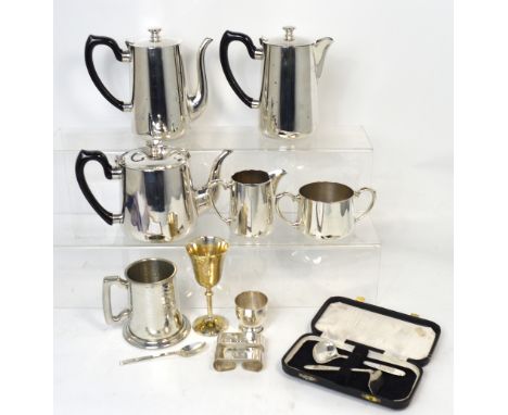 A small quantity of metalware to include a boxed silver plated christening spoon and pusher set, a silver plated tea service,
