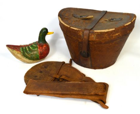 A 19th century 'Superfine' moleskin top hat in a leather carrying case, a gun musket bag and a vintage decoy duck (3). CONDIT