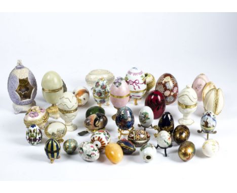 An extensive collection of forty plus decorative eggs including ceramic, glass and marble examples, to include items in the f