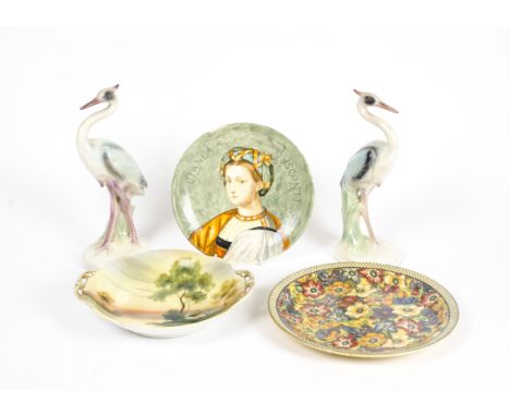Two small boxes of ceramics including a Conta &amp; Boehme dish formed with an outstretched cherub reclining forward, two Min