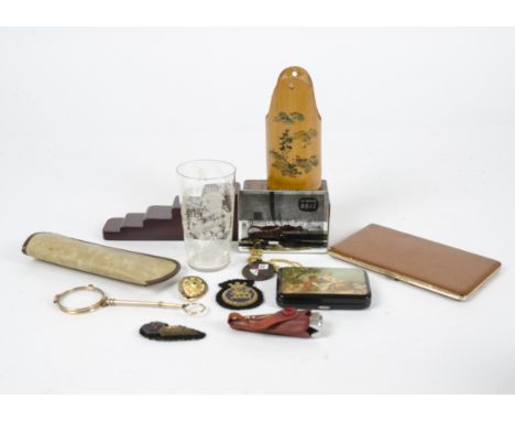 A group of military items including bullion badges and other enamel badges of sporting interest together with a glass souveni