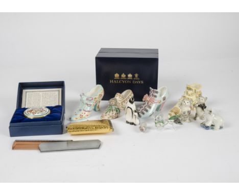 A collection of twelve Halcyon Days ceramic shoes and two enamel pill boxes together with various dressing table items and a 